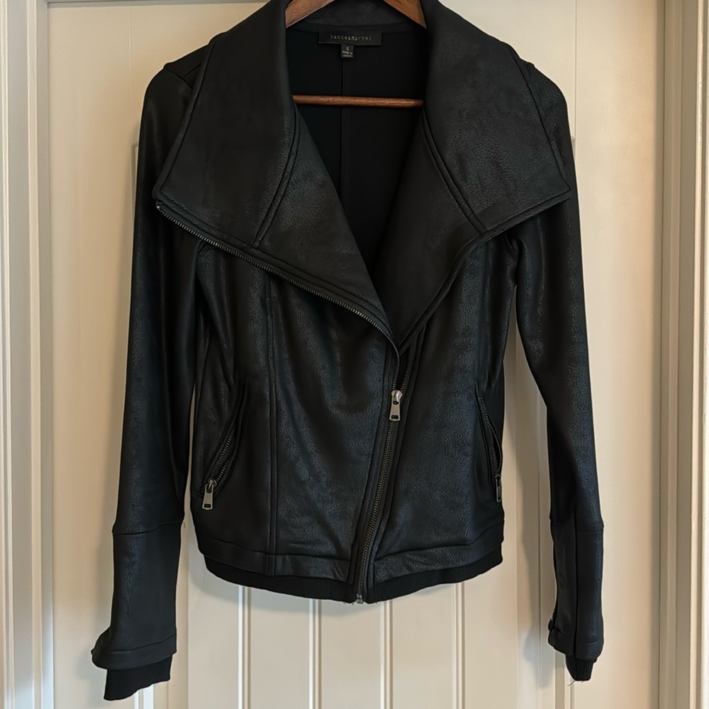Black motorcycle jacket in size small.